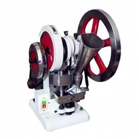 Штампувальна машина для таблеток